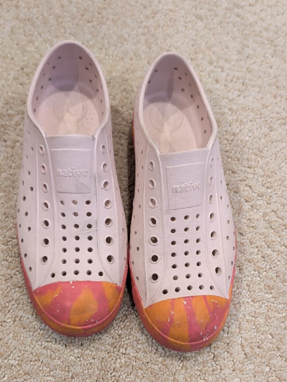 Native Shoes Kids Slip-On Sneakers in Light Pink with Orange Accents